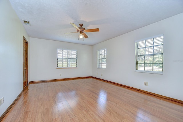3125 S Miller Rd, Valrico, FL 33596 - spare room with light wood-style floors and ceiling fan