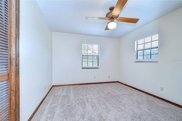 3125 S Miller Rd, Valrico, FL 33596 - carpeted spare room with baseboards and a ceiling fan