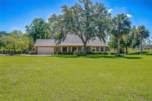 3125 S Miller Rd, Valrico, FL 33596 - view of front facade with a garage and a front yard