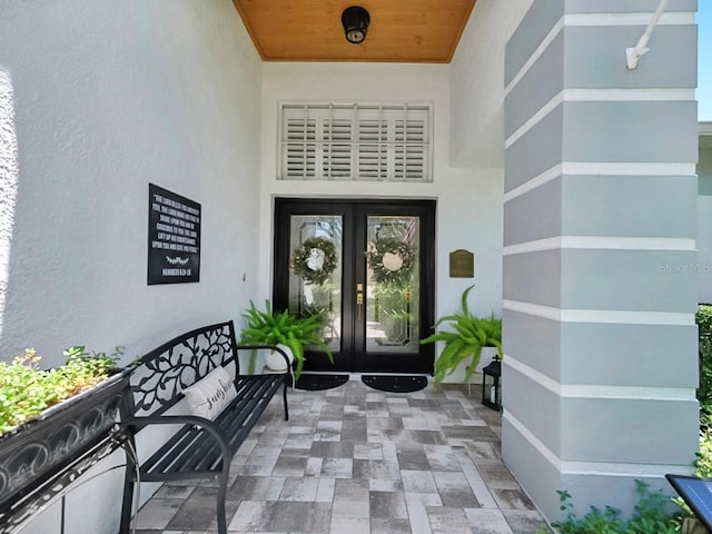 3506 Cordgrass Dr, Valrico, FL 33596 - doorway to property with french doors, stucco siding, and a patio