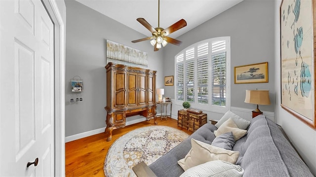 3506 Cordgrass Dr, Valrico, FL 33596 - living area with light wood finished floors, ceiling fan, and high vaulted ceiling