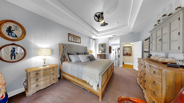 3506 Cordgrass Dr, Valrico, FL 33596 - carpeted bedroom with baseboards and a tray ceiling