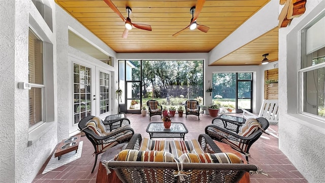 3506 Cordgrass Dr, Valrico, FL 33596 - sunroom / solarium with ceiling fan, french doors, an outdoor living space, wood ceiling, and a textured wall