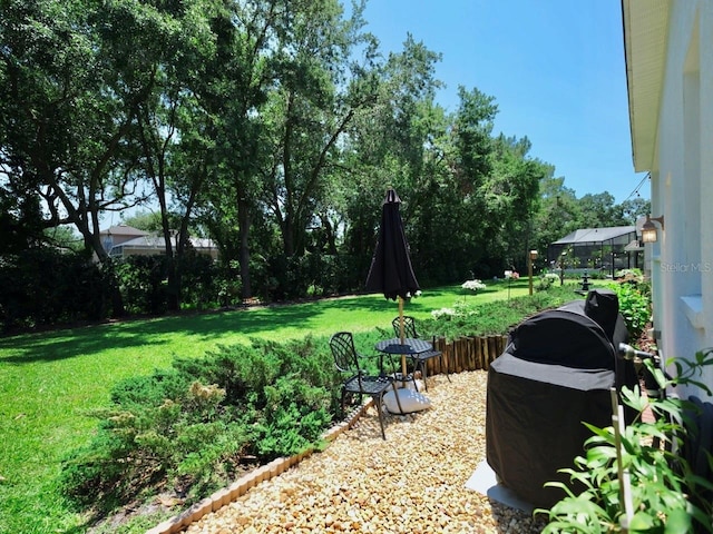 3506 Cordgrass Dr, Valrico, FL 33596 - view of grassy yard with view of scattered trees