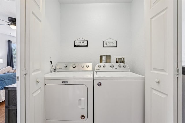 1052 Calabria Ave, Davenport, FL 33897 - washroom with washing machine and dryer, ceiling fan, and wood finished floors