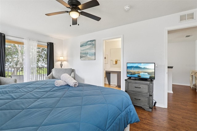 1052 Calabria Ave, Davenport, FL 33897 - bedroom featuring dark wood finished floors, connected bathroom, ceiling fan, and access to exterior