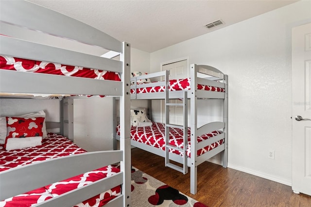 1052 Calabria Ave, Davenport, FL 33897 - bedroom with wood finished floors and baseboards