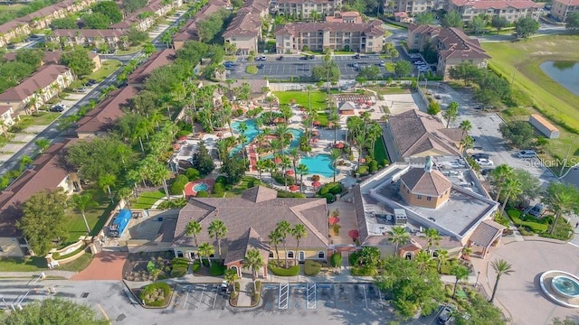 1052 Calabria Ave, Davenport, FL 33897 - aerial view of property and surrounding area featuring nearby suburban area and a nearby body of water