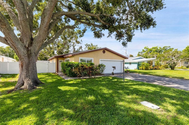 10502 Orange Blossom Ln, Seminole, FL 33772 - ranch-style home with driveway, stucco siding, and a garage