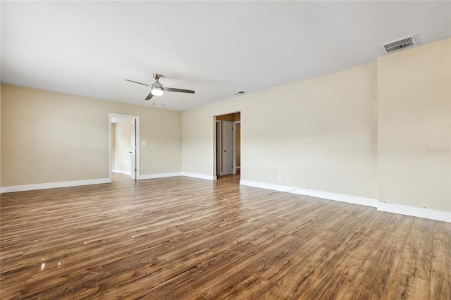 10502 Orange Blossom Ln, Seminole, FL 33772 - spare room with wood finished floors and a ceiling fan
