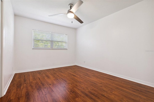 10502 Orange Blossom Ln, Seminole, FL 33772 - unfurnished room featuring dark wood-style floors and a ceiling fan