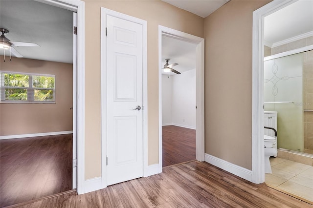 10502 Orange Blossom Ln, Seminole, FL 33772 - corridor with wood finished floors and baseboards