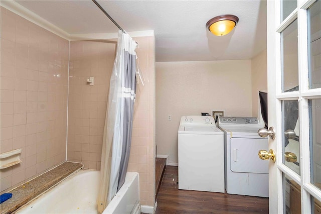 1144AND1142 7th St NW, Largo, FL 33770 - laundry area with independent washer and dryer and dark wood-type flooring
