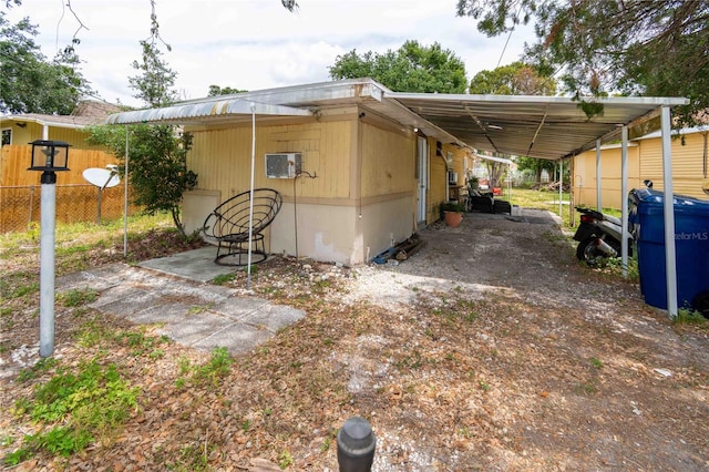 1144AND1142 7th St NW, Largo, FL 33770 - exterior space featuring an attached carport
