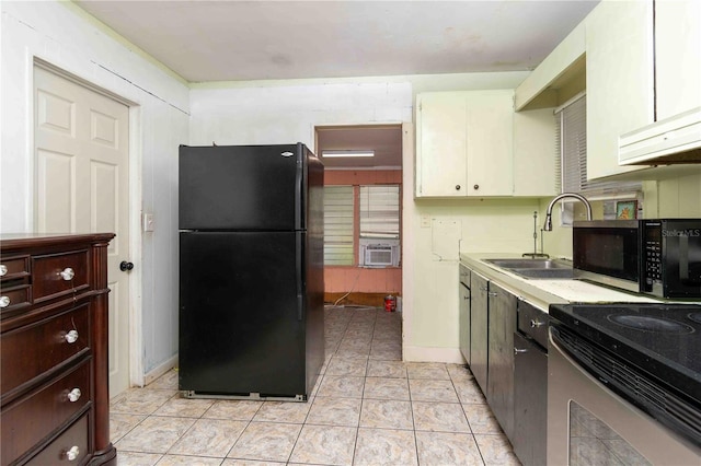 1144AND1142 7th St NW, Largo, FL 33770 - kitchen featuring appliances with stainless steel finishes, cooling unit, light countertops, ventilation hood, and white cabinets