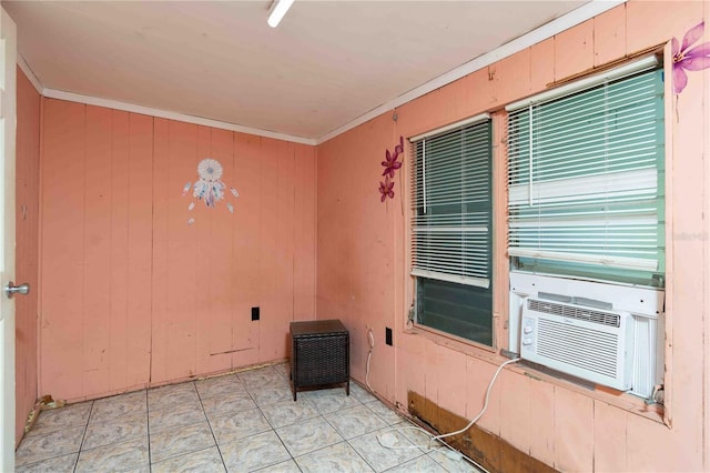 1144AND1142 7th St NW, Largo, FL 33770 - unfurnished room featuring ornamental molding, wooden walls, and cooling unit
