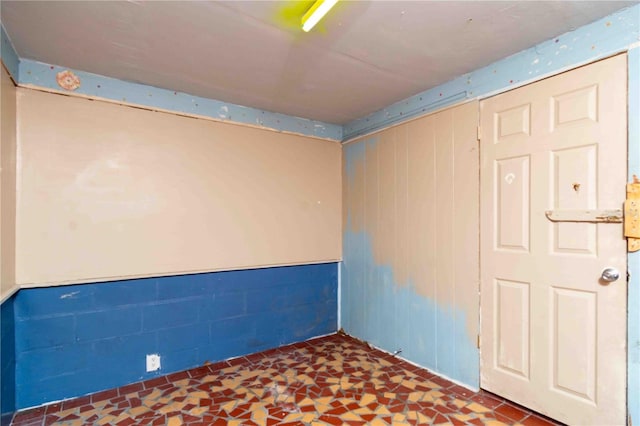 1144AND1142 7th St NW, Largo, FL 33770 - spare room featuring concrete block wall