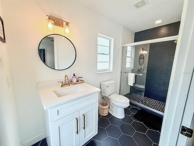 1972 Briarwood St, Dunedin, FL 34698 - bathroom featuring vanity, tile patterned floors, and a shower stall