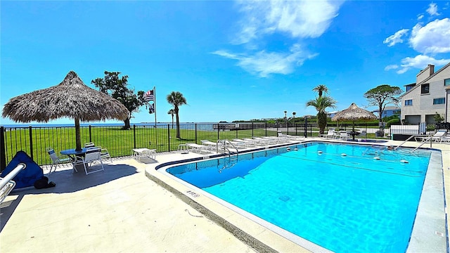 13 Windrush Bay Dr, Tarpon Springs, FL 34689 - community pool featuring a patio