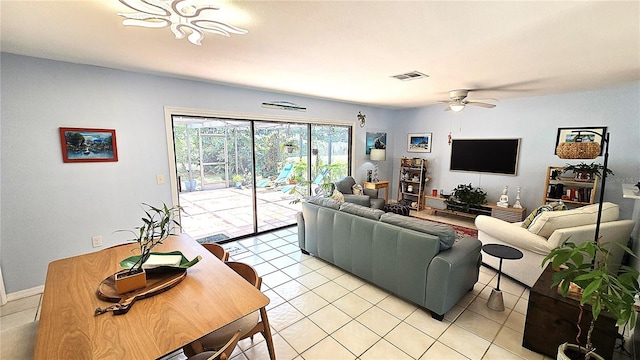 13 Windrush Bay Dr, Tarpon Springs, FL 34689 - living room with ceiling fan and light tile patterned flooring
