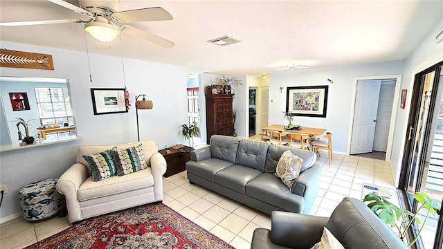 13 Windrush Bay Dr, Tarpon Springs, FL 34689 - living room with light tile patterned flooring and ceiling fan