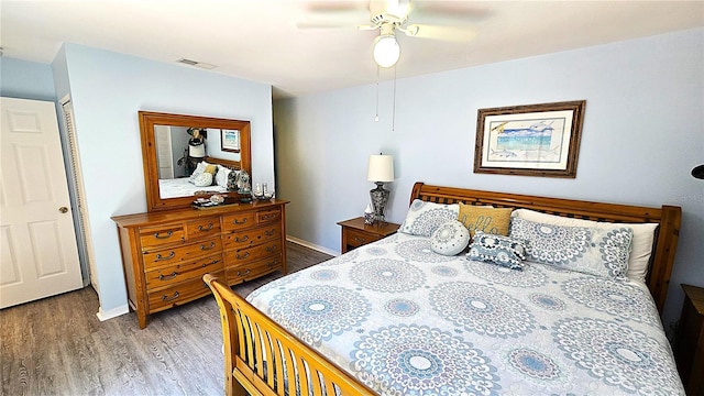 13 Windrush Bay Dr, Tarpon Springs, FL 34689 - bedroom with wood finished floors and ceiling fan
