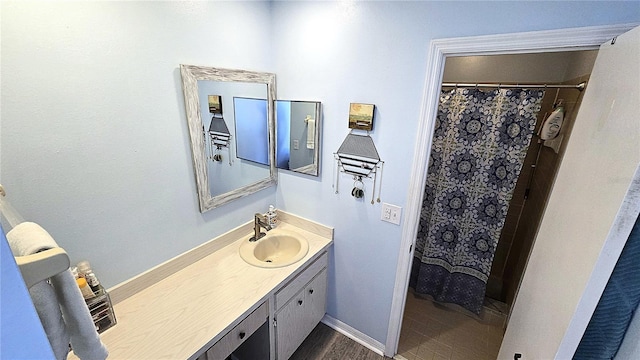 13 Windrush Bay Dr, Tarpon Springs, FL 34689 - bathroom featuring vanity, a shower with curtain, and wood finished floors