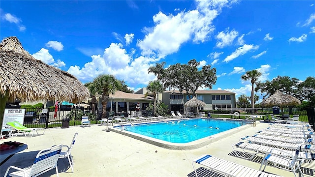 13 Windrush Bay Dr, Tarpon Springs, FL 34689 - community pool featuring a patio