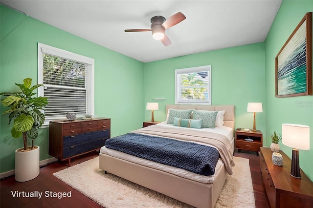 487 49th Ave N, Saint Petersburg, FL 33703 - bedroom featuring dark wood-style flooring and ceiling fan