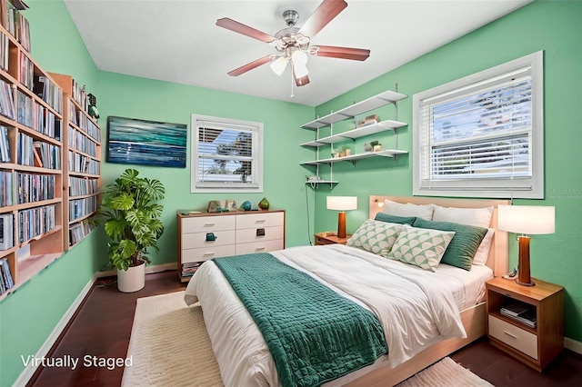 487 49th Ave N, Saint Petersburg, FL 33703 - bedroom with wood finished floors and a ceiling fan