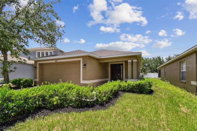 8020 Carriage Pointe Dr, Gibsonton, FL 33534 - view of front of home featuring stucco siding and an attached garage