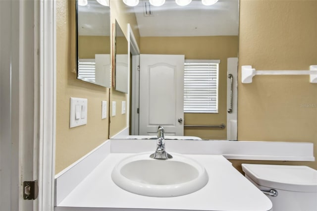 8020 Carriage Pointe Dr, Gibsonton, FL 33534 - bathroom featuring toilet and vanity
