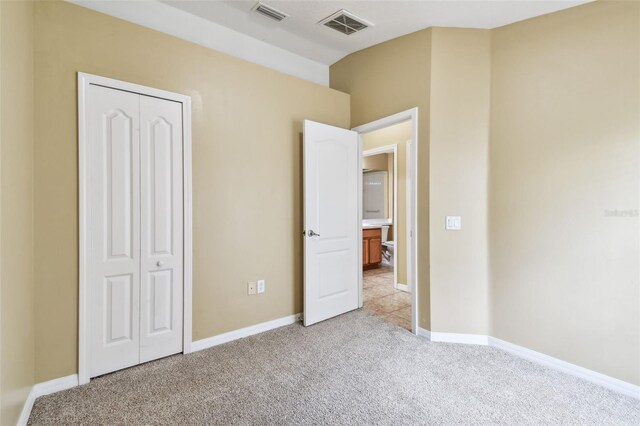 8020 Carriage Pointe Dr, Gibsonton, FL 33534 - unfurnished bedroom with carpet flooring and a closet