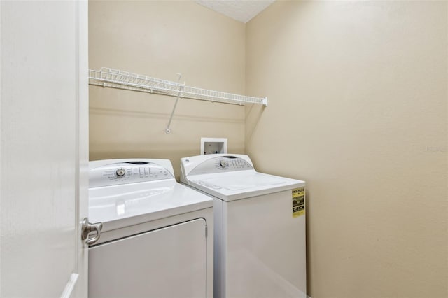 8020 Carriage Pointe Dr, Gibsonton, FL 33534 - washroom with washer and clothes dryer