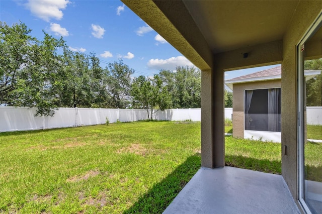 8020 Carriage Pointe Dr, Gibsonton, FL 33534 - fenced backyard featuring a patio area