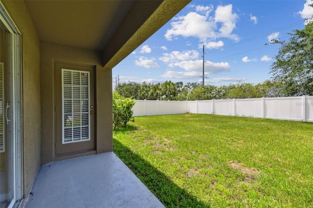 8020 Carriage Pointe Dr, Gibsonton, FL 33534 - fenced backyard with a patio