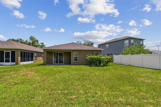 8020 Carriage Pointe Dr, Gibsonton, FL 33534 - rear view of house featuring stucco siding