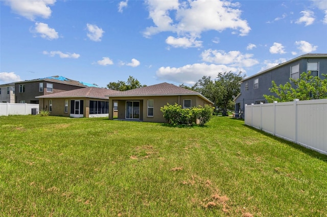 8020 Carriage Pointe Dr, Gibsonton, FL 33534 - rear view of house with stucco siding