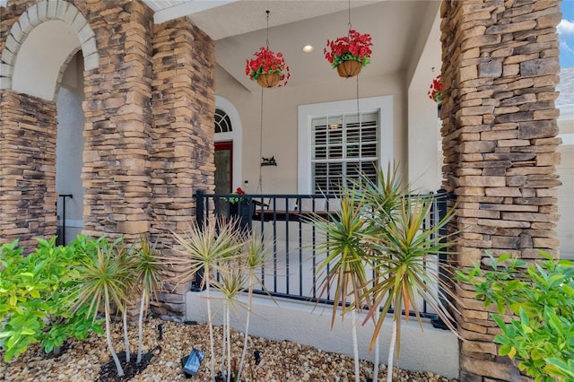 8704 Winsome Way, Land O Lakes, FL 34637 - view of exterior entry with stucco siding
