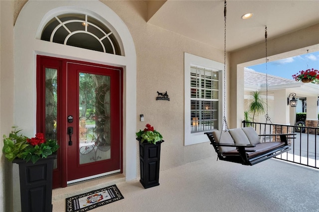 8704 Winsome Way, Land O Lakes, FL 34637 - view of exterior entry with stucco siding