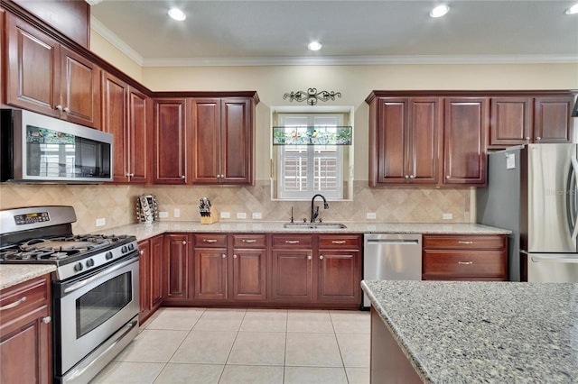 8704 Winsome Way, Land O Lakes, FL 34637 - kitchen featuring stainless steel appliances, light stone countertops, light tile patterned flooring, decorative backsplash, and ornamental molding