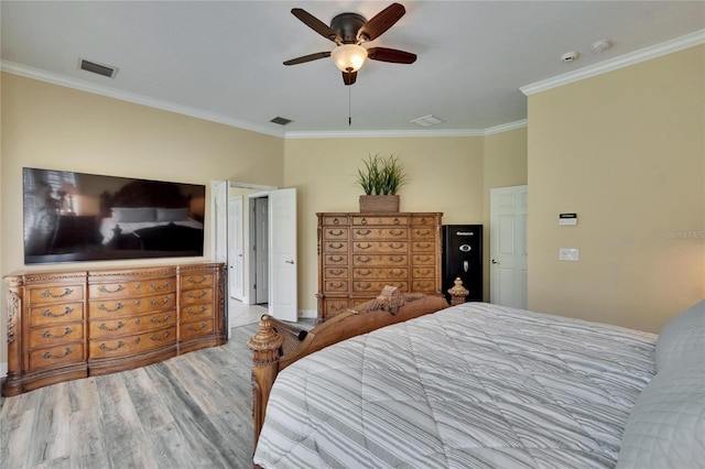 8704 Winsome Way, Land O Lakes, FL 34637 - bedroom featuring wood finished floors, ornamental molding, and ceiling fan