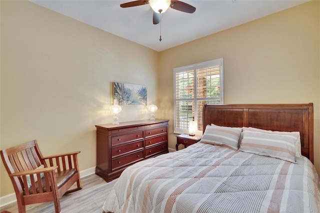 8704 Winsome Way, Land O Lakes, FL 34637 - bedroom with light wood-type flooring and ceiling fan
