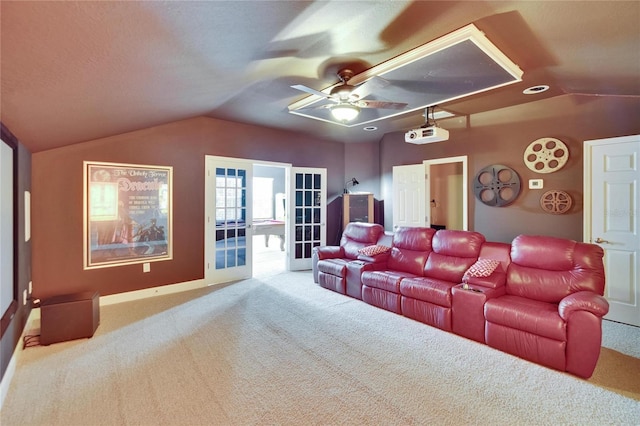 8704 Winsome Way, Land O Lakes, FL 34637 - carpeted home theater featuring vaulted ceiling, a ceiling fan, and french doors