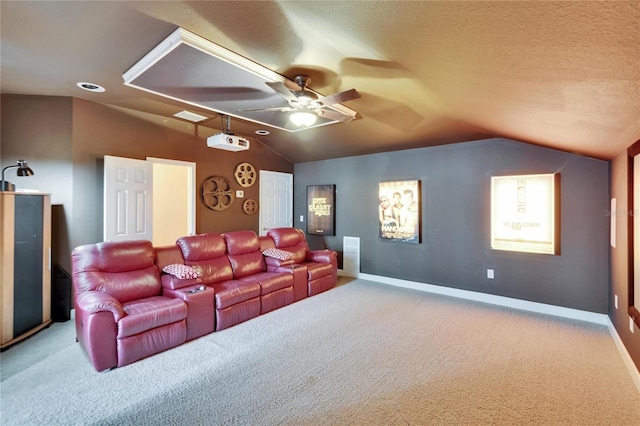 8704 Winsome Way, Land O Lakes, FL 34637 - home theater room featuring vaulted ceiling, carpet floors, and a ceiling fan