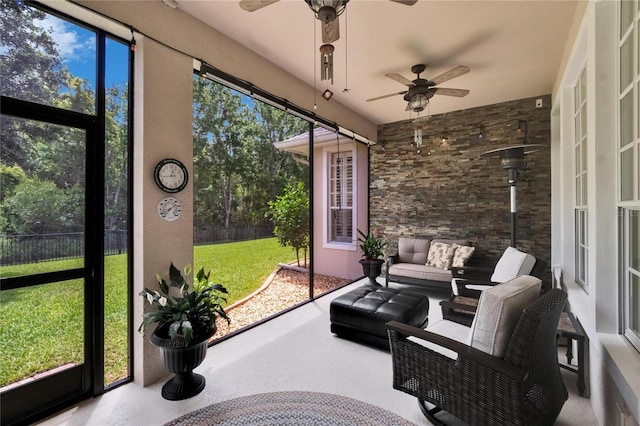 8704 Winsome Way, Land O Lakes, FL 34637 - sunroom / solarium featuring ceiling fan and outdoor lounge area