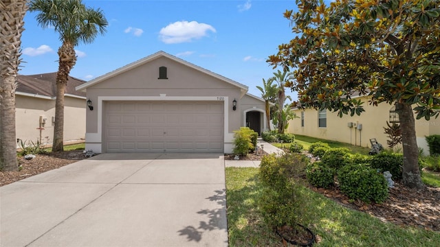 7120 Forest Mere Dr, Riverview, FL 33578 - single story home with driveway, stucco siding, and an attached garage