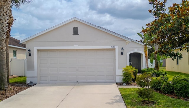 7120 Forest Mere Dr, Riverview, FL 33578 - view of front facade featuring stucco siding, concrete driveway, and a garage