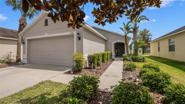 7120 Forest Mere Dr, Riverview, FL 33578 - view of front facade with a garage, stucco siding, concrete driveway, and a front lawn