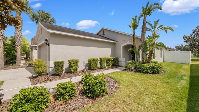 7120 Forest Mere Dr, Riverview, FL 33578 - view of front of property with stucco siding, an attached garage, and driveway